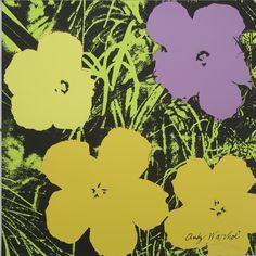 an image of three flowers that are in the middle of green and yellow colors on black background