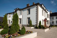 a large white house with lots of windows