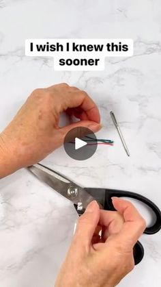 someone is using scissors to cut the wires