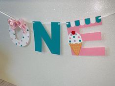 there is a banner that says no ice cream on the line with an ice cream cone hanging from it