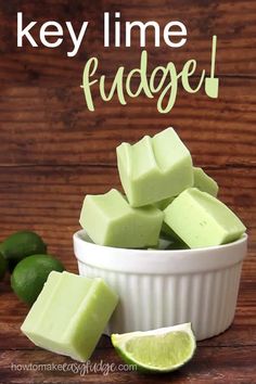 key lime fudge in a small white bowl with limes around it on a wooden table