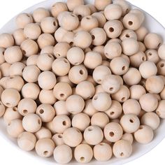 small wooden beads in a white bowl