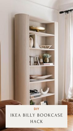 a living room filled with furniture and bookshelves