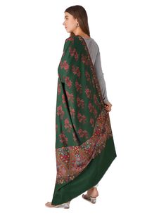 Discover timeless elegance with our Classic Green Pashmina Shawl, adorned with exquisite embroidery. Crafted from luxurious pashmina, this shawl combines traditional craftsmanship with contemporary style, perfect for enhancing your wardrobe with sophistication. Product Details: Hand Embroidered Kashmiri Pashmina Shawl Material: Pure Pashmina (100% Cashmere) Size: 100 cm X 203 cm / 40 Inch X 80 Inch / 1.1 x 2.2 Yards (Approx) Color: Green Embroidery: Elegant and intricate patterns Origin: Handcra Elegant Green Embroidered Shawl, Green Shawl With Resham Embroidery In Traditional Drape, Green Pashmina Shawl For Wedding, Green Pashmina Shawl In Traditional Drape, Green Traditional Pashmina Shawl, Green Embroidered Shawl For Eid, Embroidered Green Shawl For Eid, Elegant Pashmina Shawl With Traditional Patterns, Semi-stitched Embroidered Pashmina Fabric For Eid