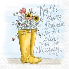 a yellow boot with flowers in it and the words may the rain be with you