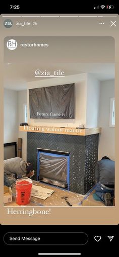 an image of a living room being remodeled with the fireplace covered in plastic sheeting