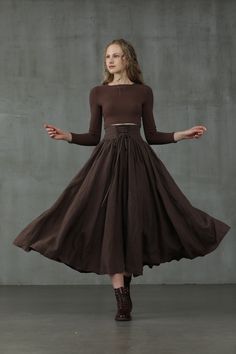 "Showing again how to reinvent classic silhouettes, Linennaive crafts this full skirt with a lace-up waistband for a contemporary appeal. In a burnt orange and dark chocolate shade, the skirt is cut for a flared fit and sits high at the waist for an elongating silhouette. Promoting equality with classic and uniform pieces, the sleek and metropolitan mood is always present. Featuring great pure linen, side pockets, lace-up waistband. 【Fabric】 100% Linen, around 220g/gram Every year we have a dedi Maxi Linen Skirt, Tea Dance, Skirt Winter, Retro Skirt, Mode Boho, My Fair Lady, Fair Lady, Brown Skirts, Party Skirt