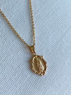 Medal Size: 11mm x 17mm Chain Length: 16", 18", 20" About Gold Filled Jewelry:What is gold-filled? We carry gold filled jewelry that is composed of a solid layer of 18kt gold, that is bonded to a base metal. Gold Filled and vermeil jewelry are great quality alternatives to solid gold. With proper care and storage, you will have jewelry that will last a lifetime. Tips to make your jewelry last:1. Keep it dry. Store your jewelry in the plastic bag included in your purchase.2. Avoid harsh chemicals such as perfume, hairspray, lotions and oils.3. Never use abrasive products to clean your jewelry. Hispanic Jewelry, Lady Of Guadalupe Necklace, Guadalupe Necklace, Edgars Haircut, Promise Keeper, Virgin Mary Necklace, Xmas List, Gold Filled Necklace, Our Lady Of Guadalupe