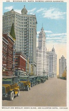 an old postcard with cars parked on the street in front of tall buildings and skyscrapers