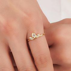 About this item Introducing the exquisite Unique Engagement Ring in Real Gold, designed to captivate with its stunning allure and timeless elegance. Crafted with utmost precision, this exquisite piece is perfect for those seeking a symbol of eternal love and commitment 𝐈𝐭𝐞𝐦 𝐃𝐞𝐭𝐚𝐢𝐥𝐬 * Gold KT: 10K, 14K, 18K * Custom Gold Color: Rose Gold, Yellow Gold, White Gold * Width of Band: 1.18MM * Thickness of Band: 0.9-82MM 𝐆𝐞𝐦𝐬𝐭𝐨𝐧𝐞 𝐃𝐞𝐭𝐚𝐢𝐥𝐬 * Cubic Zirconia * Total CTW: 0.13ctw WHY COSMIC FINE JEWELRY? ✓ Crafted with precision by skilled artisans with 10 years of experience in fine jewelry craftsmanship ✓ Uncompromising on quality to ensure customer satisfaction with every piece ✓ Exudes elegance and sophistication, perfect for special occasions or everyday wear ✓ Thoughtfu Elegant 14k Gold Crystal Toe Ring, Delicate 14k Gold Marquise Cut Ring, Delicate Marquise Cut Diamond Ring Gift, Delicate Marquise Cut Diamond Ring, Dainty Gold Marquise Cut Rings, Delicate Crystal Ring For Anniversary, Delicate Marquise Cut Diamond Ring For Anniversary, Delicate Anniversary Crystal Ring, Dainty Gold Marquise Diamond Ring