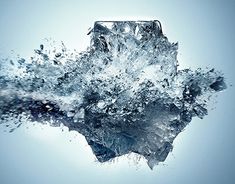 an ice cube with water splashing out of it's side on a blue background