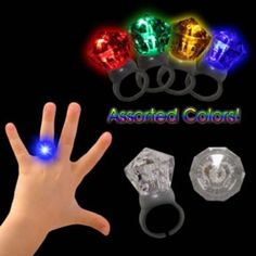 four different colored lights in the shape of hands and fingers, with one hand extended up to