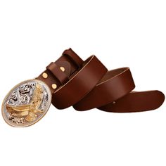 Brown western belt straight out of the West. Add the essential touch to your Western outfit with this handsome belt. Expertly handcrafted, this full-grain leather cowboy belt features a majestic golden eagle at the heart of its buckle. What's more, it's designed with an ultra-handy screw system that lets you swap out its buckle in a flash. The modern cowboy's favorite belt. A classic representation of Western charm, the second you fasten this exceptional belt, you're guaranteed to become the cen Modern Cowboy, Board Game Storage, Bar Accessories Decor, Game Storage, Cowboy Belt, Western Outfit, Belt For Men, Classic Office, Western Belt