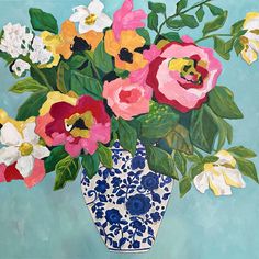 a painting of colorful flowers in a blue and white vase on a blue background with green leaves