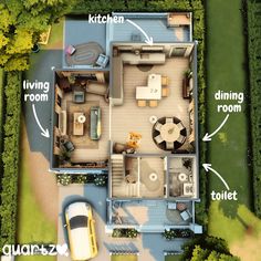 an aerial view of a house with the living room, dining room and bathroom labeled