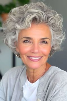 Save this pin for the best hairstyles for women over 60 with fine hair. The beauty of curls can truly shine with a pixie bob like this, which adds a bouncy, vivacious touch to the traditional bob. A mix between a pixie and a bob, the curls give a natural lift to the hair.