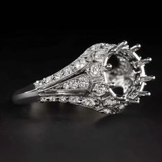 This gorgeous vintage inspired semi-mount is beautifully designed to capture the glamour and romantic style of vintage design! Shimmering with vibrant accent diamonds, the setting is richly designed with chic geometric details and precise cut outs. The effect is an air of romance and Old Hollywoo... Vintage Engagement Ring Settings, Floral Engagement Ring, Vintage Style Rings, Vintage Diamond Rings, Diamond Engagement Ring Set, Natural Diamond Engagement Ring, Ring Setting, Jewelry Manufacturers, Romantic Style