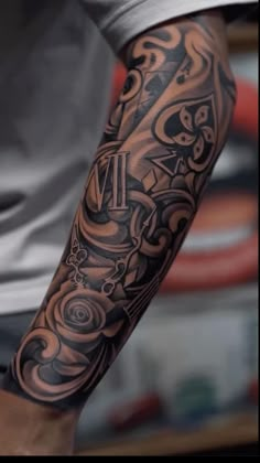 a man with a tattoo on his arm