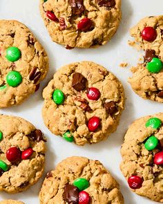 chocolate chip cookies with m & m candies and candy canes in the middle