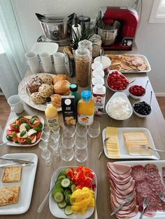 a table filled with food and drinks on top of it