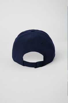 Top off your look with the Performance Off-Duty Cap -- Alo's limited-edition, fresh take on the classic dad cap. This street style must-have features our signature logo and the adjustable back elastic webbing and buckle makes this piece fit for everybody. Classic Sports Fitted Hat With Curved Visor, Classic Navy Baseball Cap With Curved Visor, Classic Sports Trucker Hat With Curved Visor, Classic Baseball Cap With Curved Visor For Sports Events, Classic Trucker Hat With Curved Visor For Sports, Classic Adjustable Baseball Cap For Sports, Classic Baseball Cap For Sports Events, Classic Sports Visor Fitted Hat, Classic Visor Fitted Hat For Sports