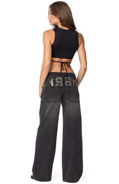 Amp up your casual-cool game in these nonstretch wide-leg jeans designed with a low rise and a leopard date stamp on the back. Zip fly with button closure Five-pocket style 100% cotton Machine wash, dry flat Imported Edikted Jeans, Visionary Fashion, Swimwear Dress, Low Rise Jeans, Party Tops, Designer Jeans, Basic Tee, S Models, Wide Leg Jeans