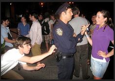 a police officer talking to a girl in front of a group of people with the caption just keep talking charmingly