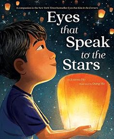 the cover of eyes that speak to the stars, with an image of a boy holding a lantern