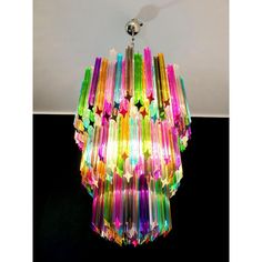 a multicolored chandelier hanging from the ceiling