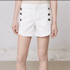 White Anthropologie Cartonnier Sailor Shorts. Whites Sailor Button Detail. Little Tulip Hem Detail. Brand New With Tags. Size 4. Waist Measures About 15”, Rise 9”, Inseam 4” Chic Summer Button-up Bottoms, Chic Button-up Summer Bottoms, White Button-up Bottoms For Spring, Summer Bottoms With Buttons In Short Length, Summer Short Bottoms With Buttons, Chic Summer Bottoms With Buttons, Chic Summer Shorts With Button Cuffs, Chic Bottoms With Buttons For Summer, Spring High Waist Buttoned Shorts