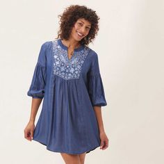 Chambray Dress With Light Blue Embroidery Dress - rockflowerpaper Spring Beach Embroidered Mini Dress, Spring Embroidered Beach Mini Dress, Indigo V-neck Summer Dress, Flowy Breezy Tunic Dress, Summer Mini Dress With Embroidered Hem And Long Sleeves, Long Sleeve Mini Dress With Embroidered Hem For Summer, Embroidered Summer Dress For Day Out, Summer Embroidered Mini Dress, Long Sleeve Embroidered Summer Beach Dress