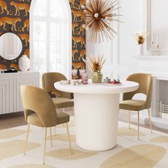 a dining room table with chairs and a wallpapered area in the back ground