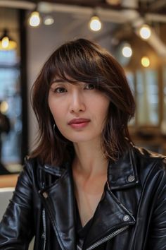 Woman with elegant side-swept fringe enhancing her hairstyle. Suits You, Natural Beauty, Bangs, Tap, Hair