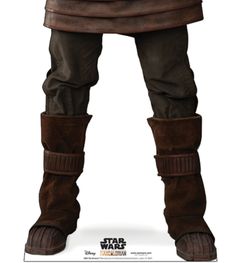 the star wars character is dressed in brown leather and has his hands on his hips