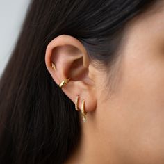 Classic Gold conch ear cuff that will hug your conch perfectly. Perfect to wear alone or paired with other huggie earrings. Sold as a single earring. Gold Vermeil Hypoallergenic, lead and nickel free Thickness 3mm Inner Diameter 0.35in(9mm) #J522-G Hypoallergenic Huggie Wrap Earrings, Minimalist Huggie Ear Cuff With Ear Wire, Adjustable Huggie Wrap Earrings For Pierced Ears, Adjustable Huggie Ear Cuff With Ear Wire, Pierced Adjustable Huggie Ear Cuff, Adjustable Pierced Huggie Ear Cuff, Gift Huggie Ear Cuff Tarnish Resistant, Adjustable Huggie Cartilage Earring, Adjustable Single Huggie Cartilage Earring