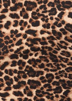 an animal print pattern is shown in brown and black