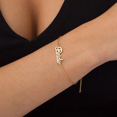 Ready to be adored, this Personalized name bracelet pairs well with any of your casual looks. Crafted in warm 10K gold, the design is centered with a single name - up to 10 characters in length - spelled out in a dainty lowercase script-style font. Sure to be a constant choice, this charming 7.0-inch link chain bracelet is polished to a bright shine and secures with a lobster claw clasp. Gold Sterling Silver Bracelet With Custom Name, Elegant Personalized Charm Bracelet With Nameplate, Elegant Personalized Nameplate Charm Bracelet, Dainty Custom Name Bracelet In 14k Gold, Elegant Nameplate Charm Bracelet For Personalized Gift, Personalized Dainty White Gold Name Bracelet, Elegant Custom Name Charm Bracelet For Anniversary, Personalized White Gold Dainty Name Bracelet, Dainty 14k Gold Bracelet With Custom Name