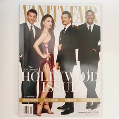 the cover of vanity fair magazine featuring two men and a woman in evening wear, standing next to each other