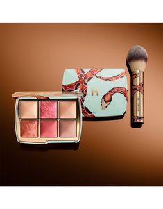 A limited-edition, travel size powder brush for on-the-go application, featuring exclusive snake artwork by London-based illustrator Katie Scott. Featuring ultra-soft vegan and cruelty-free bristles, this PETA-approved brush is designed to pick up and perfectly disperse the ideal amount of powder. The high-quality Taklon bristles ensure a seamless finish. Snake Artwork, Hourglass Ambient, Katie Scott, Hourglass Makeup, Luxury Cosmetics, Cruelty Free Brands, Brush Sets, Finishing Powder, Latest Makeup