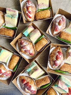 several boxes filled with different types of desserts