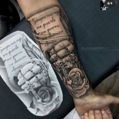 a person with a tattoo on their arm that has an image of a ship and roses