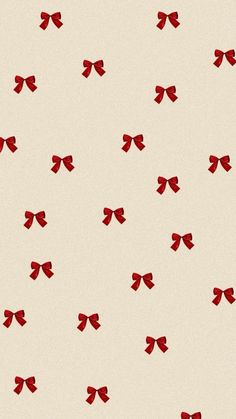 red bows are flying in the air on a beige background with white and black squares