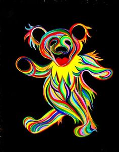 a multicolored teddy bear is dancing on a black background with the words happy birthday written below it