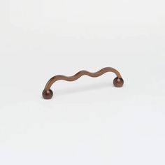 a wooden handle on a white background