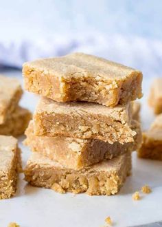 several pieces of peanut butter bars stacked on top of each other