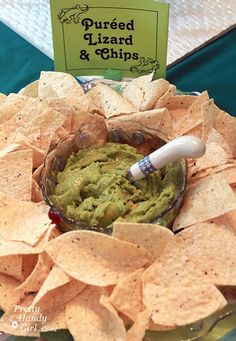 a bowl filled with guacamole and chips