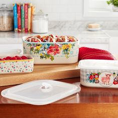 the kitchen counter is cluttered with dishes and utensils, including one for casserole