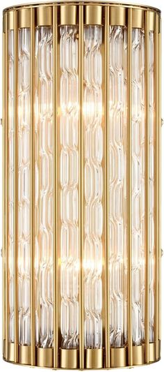 a large brass wall light with clear glass panels