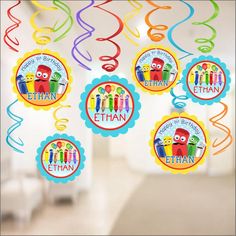 colorful birthday decorations with sesame the movie characters and name tags for each party, including streamers