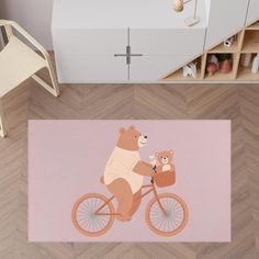 a rug with a bear riding a bike and holding a teddy bear on the handlebars